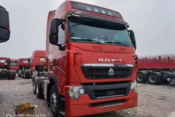 2$α ρυμουλκά 3 κόκκινο χρώμα 10 χεριών ρυμουλκών τρακτέρ τρόπου 460hp HOWO Drive καθισμάτων 6×4 ρόδες