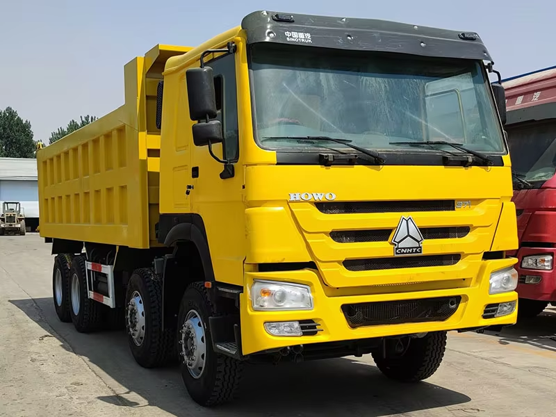 Μεταχειρισμένο Howo Dump Truck 371hp 8x4 Left Hand Drive Engine AC 12 Wheels for Zimbabwe
