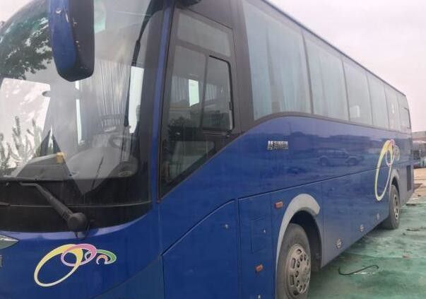 Το μπλε χρώμα εμπορικών σημάτων Sunlong χρησιμοποίησε το λεωφορείο 51 καλή συνθήκη 3600mm λεωφορείων καθισμάτων ύψος λεωφορείων