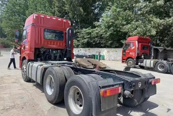 Η μηχανή 460hp Weichai τρόπου Drive κόκκινου χρώματος 6×4 έτους ρυμουλκών το 2021 κιβωτίων αλόγων από δεύτερο χέρι χρησιμοποίησε το φορτηγό τρακτέρ FAW